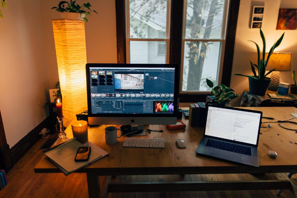 Laptop and desktop on desk