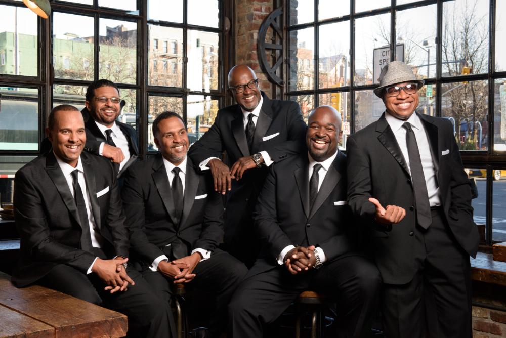 members of Take 6 (Claude McKnight, Mark Kibble, Joel Kibble, Dave Thomas, Alvin Chea, and Khristian Dentley)