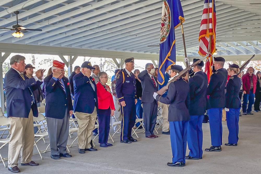 US Military veterans stand for presentation of Virginia and United States flags