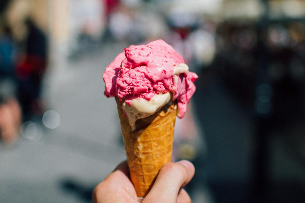 A strawberry ice cream cone.