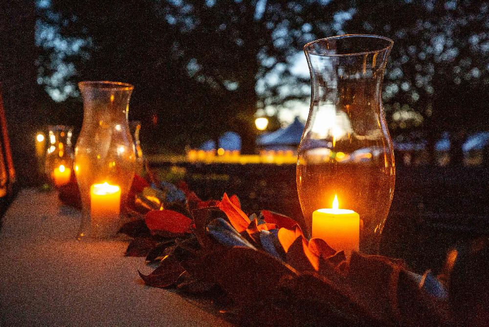 Candles lit at twilight