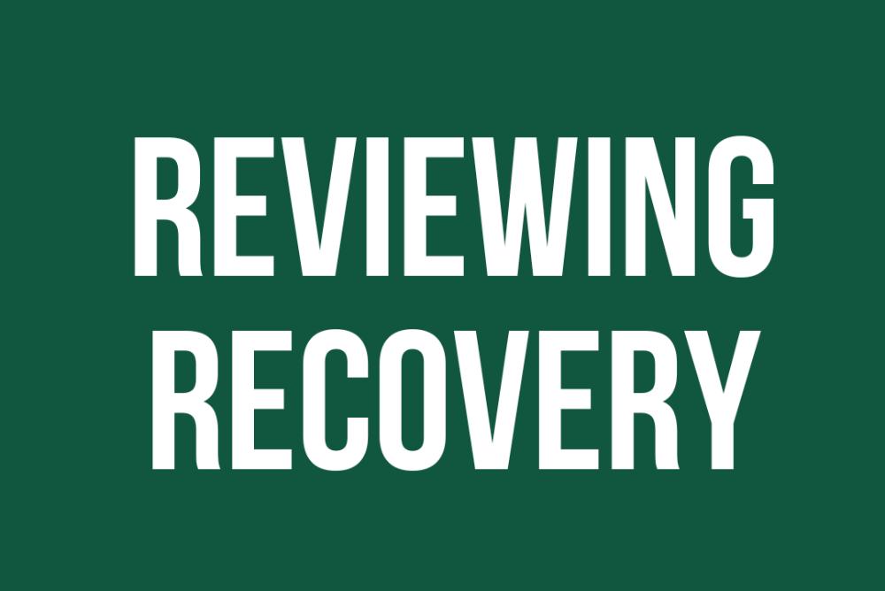 Green background with reviewing recovery written in white text